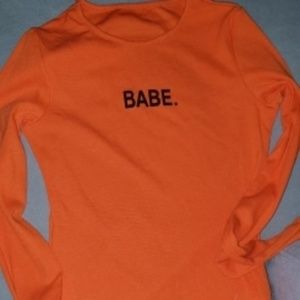 Tops - New with tags 'BABE' orange body suit Tops - New with tags 'BABE' orange body suit